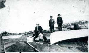 (l to r) Oswald Quesnel, Capt. E.A. Pelletier, Chief Paddy Johnson. Hole River ca. 1910 -1911