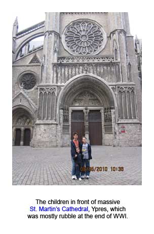 The children in front of massive St. Martins Cathedral, Ypres