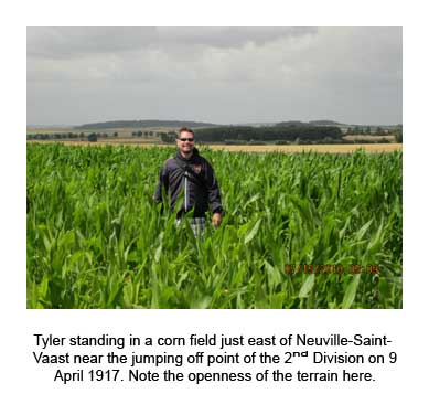 Tyler standing in a cornfield