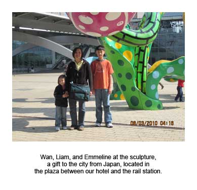 Wan, Liam, and Emmeline at the sculpture