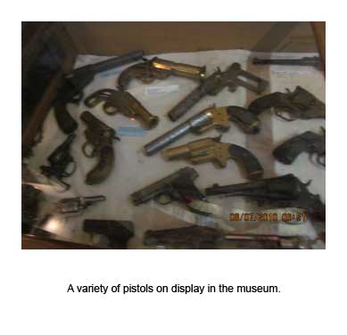 A variety of pistols on display in the museum
